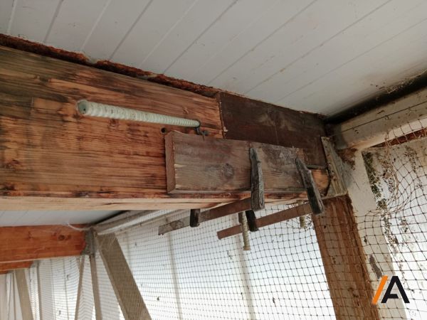 restauracion de viga de madera con varillas de hierro corrugado